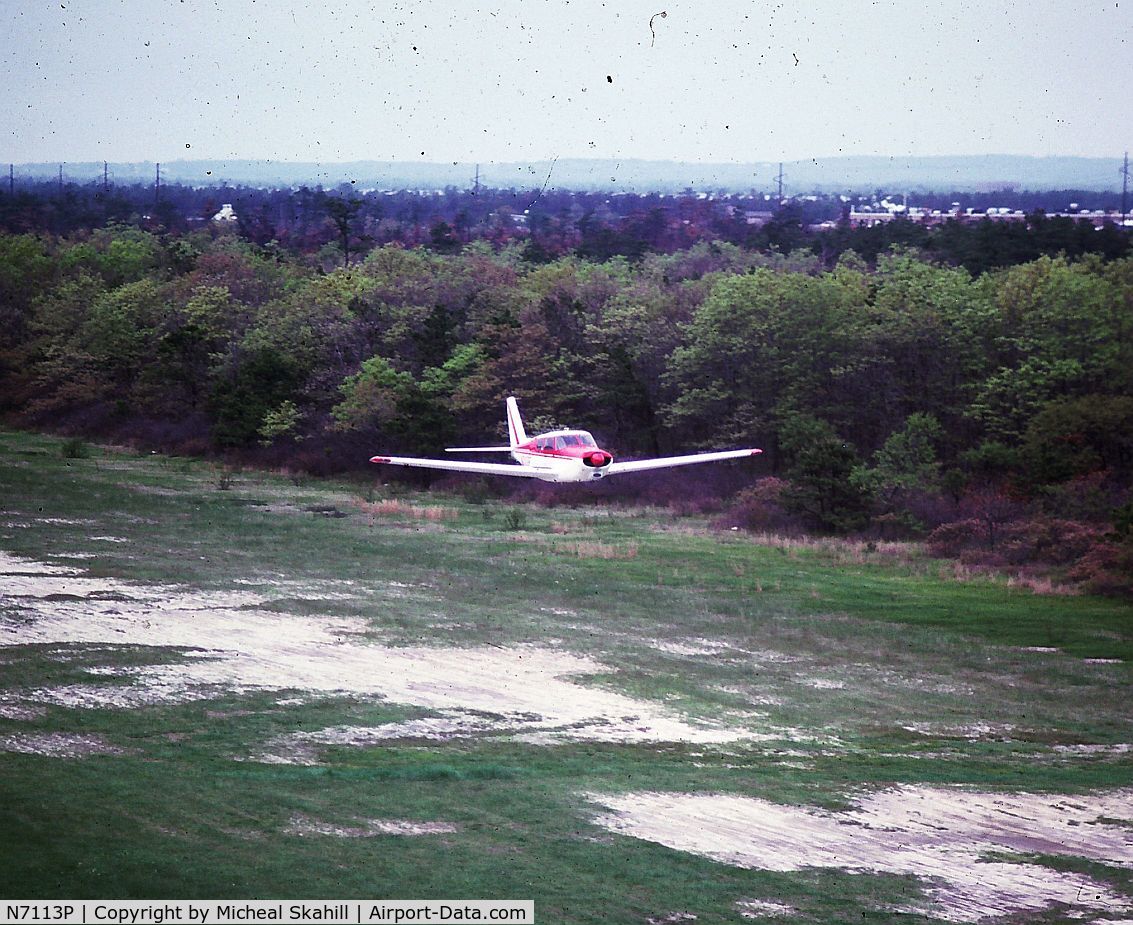 N7113P, 1960 Piper PA-24 Comanche C/N 24-1879, Flyby at Edwards Airport Long Island NY (No longer in use)