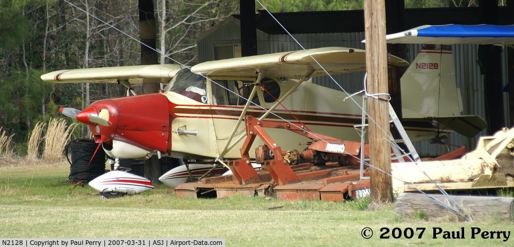 N2128, 1968 Stits SA-7D Skycoupe C/N 475, Talk about hidden!  There she sits, far from the maddening crowd