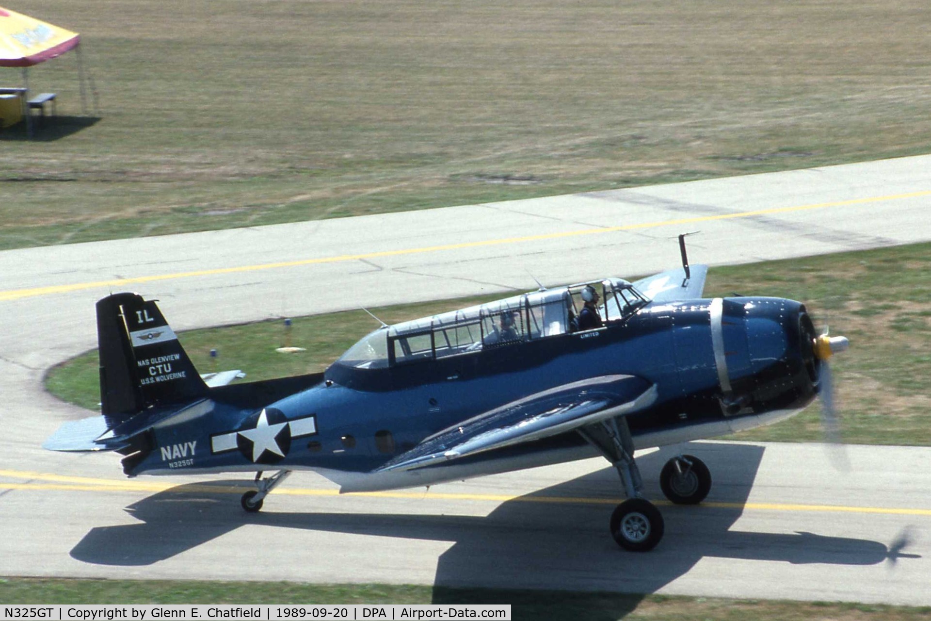 N325GT, Grumman TBM-3E Avenger C/N 69325, New paint, taxiing by the control tower
