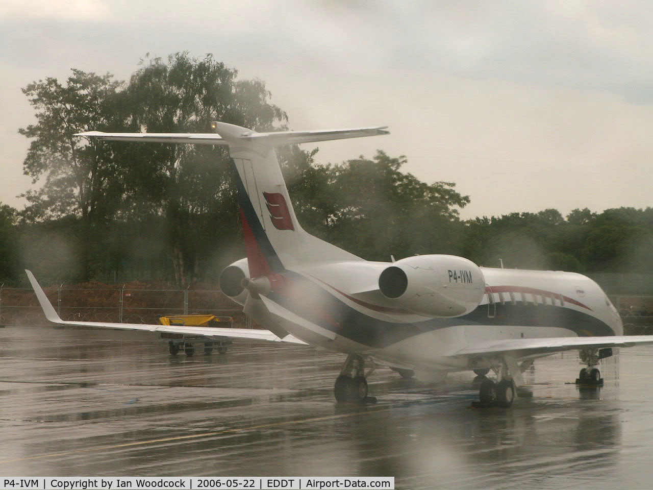 P4-IVM, 2008 Embraer EMB-135BJ Legacy 600 C/N 14501031, Embraer ERJ-135 BJ/Taken through the aircraft window on a very wet day at Berlin-Tegel