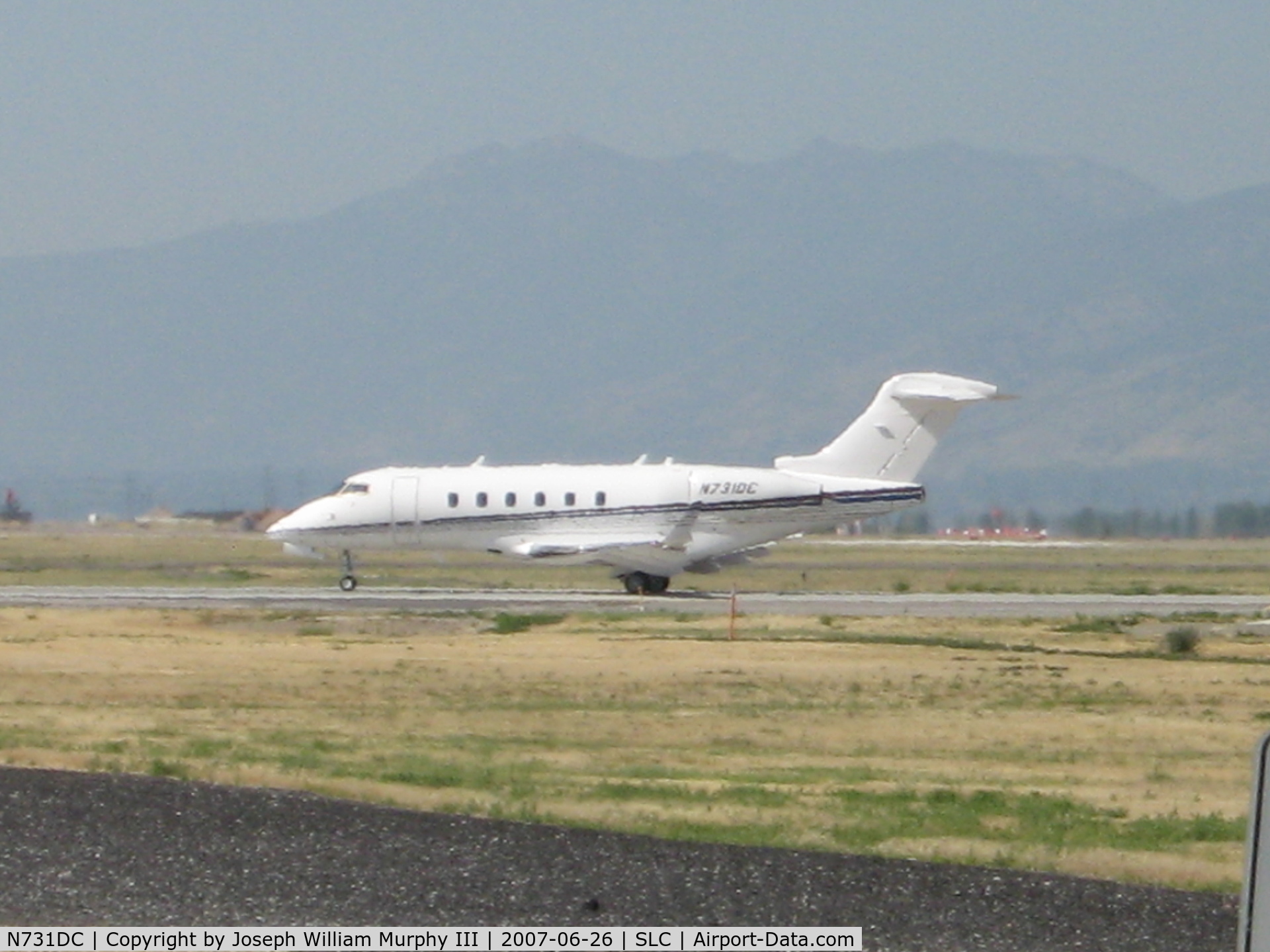 N731DC, 2005 Bombardier Challenger 300 (BD-100-1A10) C/N 20073, Taxiing to Runway from General Aviation... (Runway 34R)