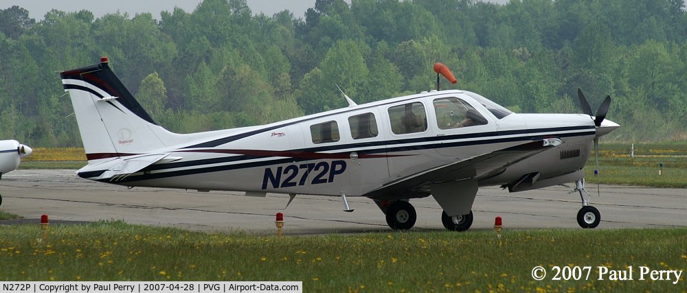 N272P, Raytheon Aircraft Company A36 Bonanza C/N E-3626, One of two planes sitting by their lonesome on this overcast day
