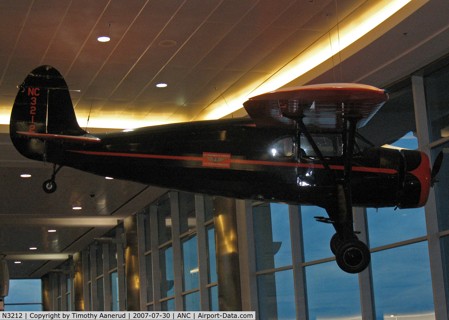 N3212, 1938 Fairchild 24 G C/N 2933, Hanging in the Terminal near gates C7-C9