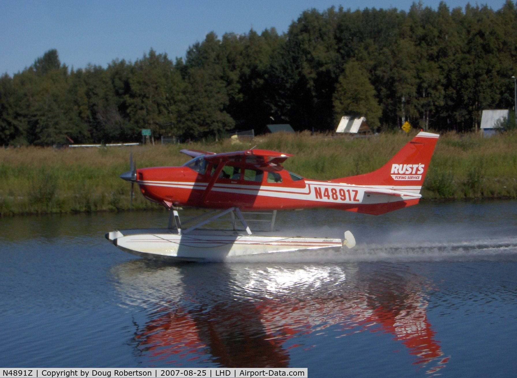 N4891Z, 1980 Cessna U206G Stationair C/N U20606044, 1980 Cessna U206G STATIONAIR 6, Continental IO-520-F 300/285 Hp, of Rust Air, multiple certification, landing