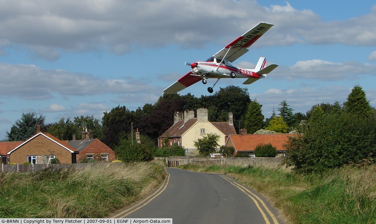 G-BRNN, 1980 Cessna 152 C/N 152-84735, Cessna 152 lands in a crosswind at this beautiful English rural setting