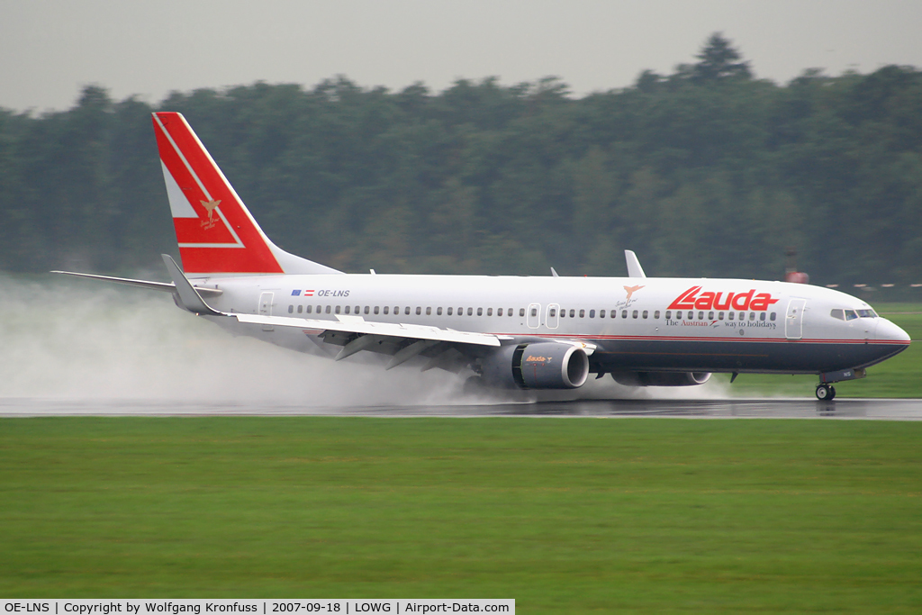 OE-LNS, 2005 Boeing 737-8Z9 C/N 34262, maximum reverse on wet runway!