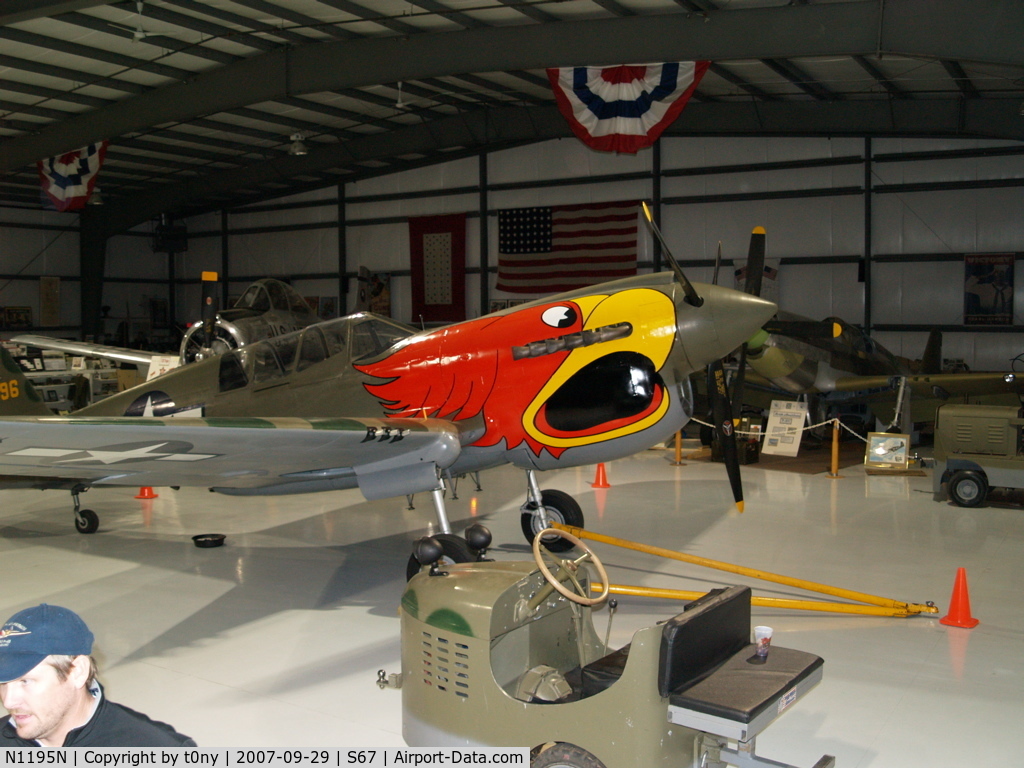 N1195N, 1942 Curtiss P-40N Warhawk C/N 130158, The new nose art on the P-40N at the Warhawk Air Museum.