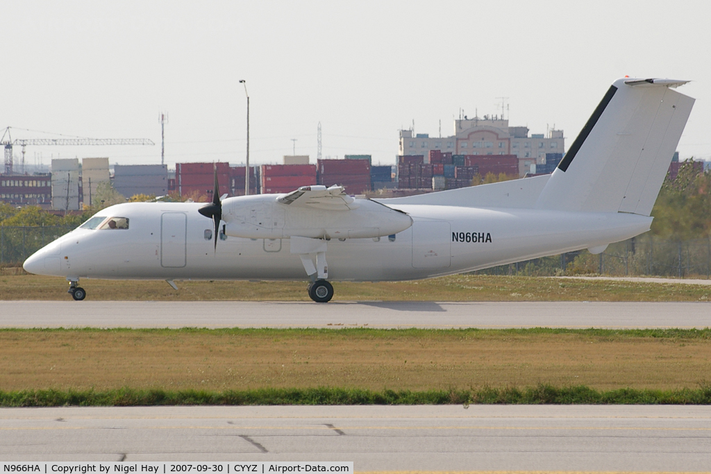 N966HA, 1997 De Havilland Canada DHC-8-202 Dash 8 C/N 452, Taxing on 15R