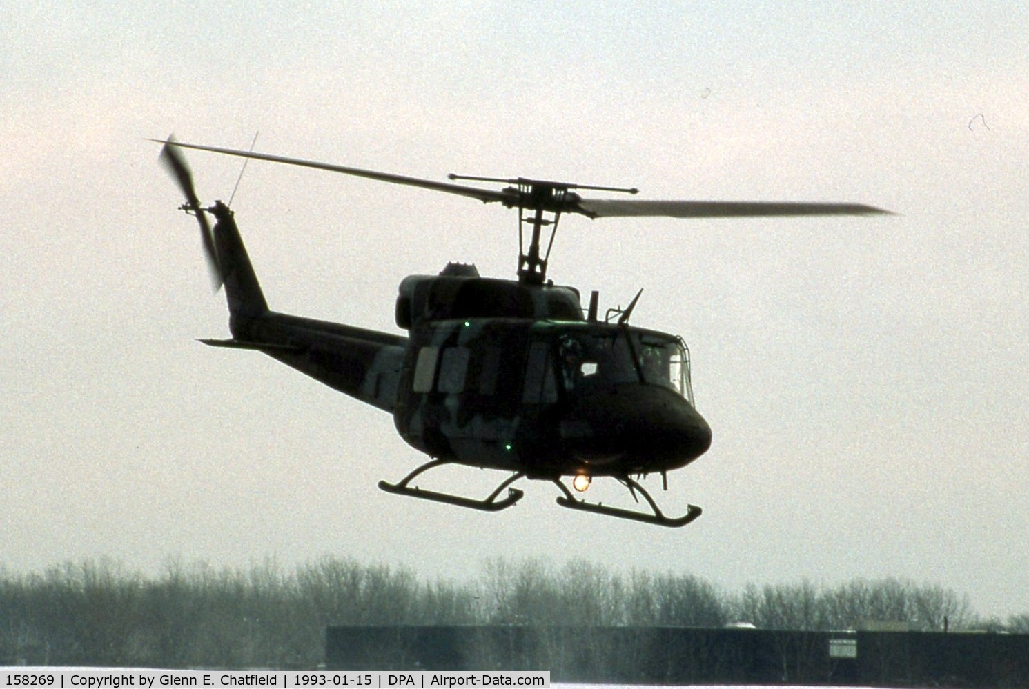 158269, Bell UH-1N Iroquois C/N 31440, UH-1N arriving just at sunset in the snow