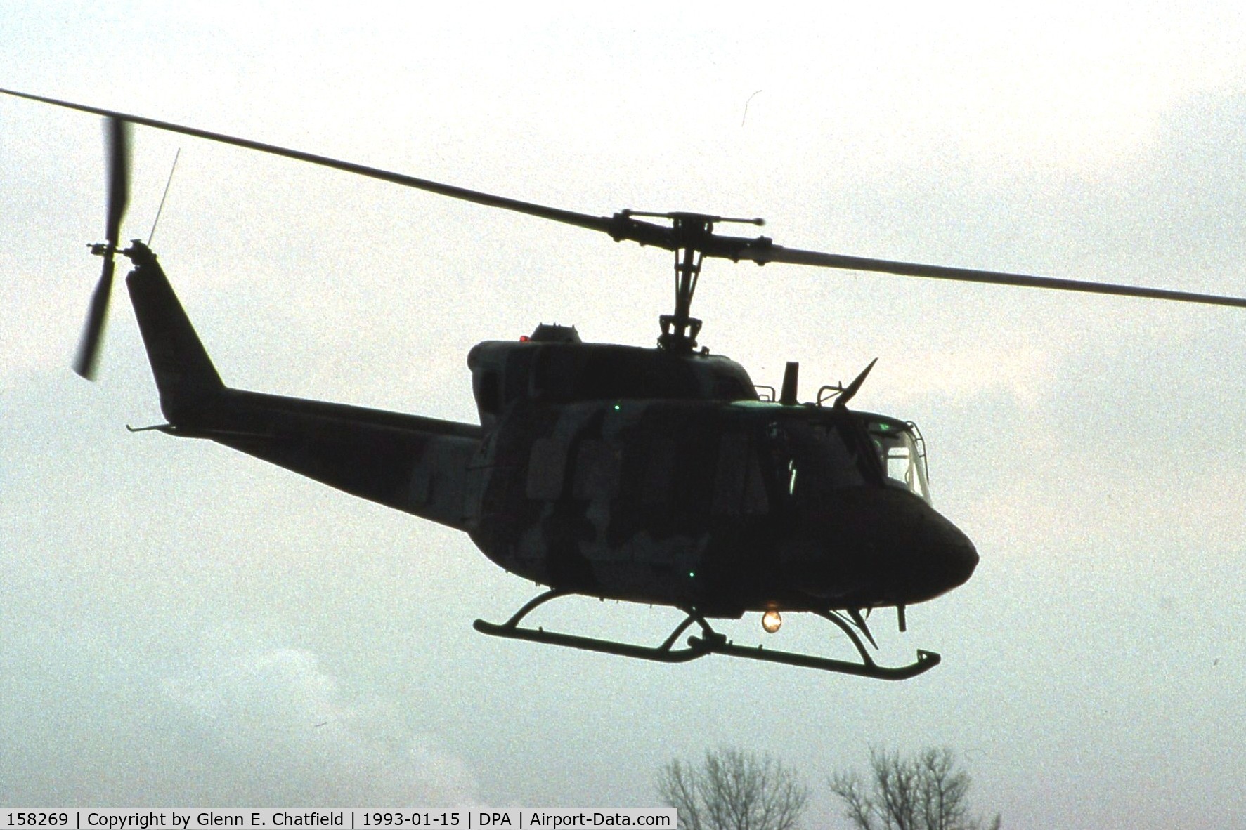 158269, Bell UH-1N Iroquois C/N 31440, UH-1N arriving just at sunset in the snow