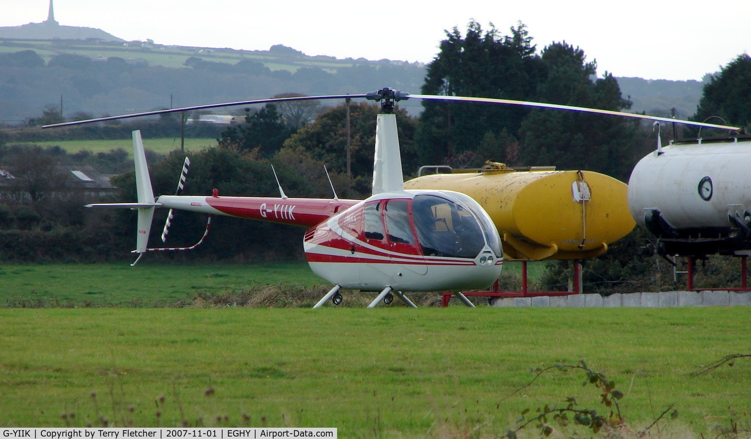 G-YIIK, 1999 Robinson R44 C/N 0640, The only aircraft at this small Cornish strip