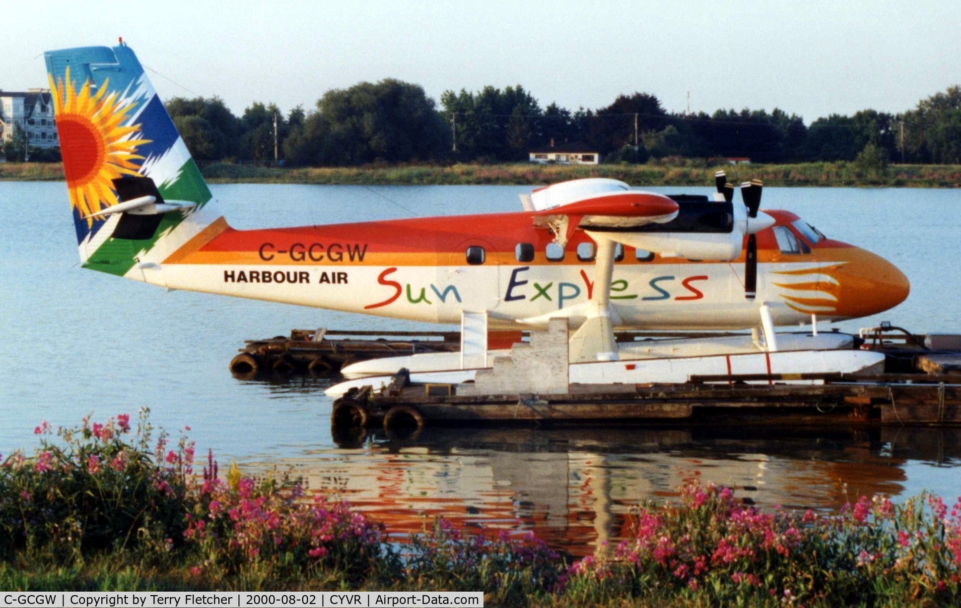 C-GCGW, 1974 De Havilland Canada DHC-6-300 Twin Otter C/N 434, Harbour Air's brightly coloured Sun Express Twin Otter c/n 434 later became 8Q-TMC and C-FDHT