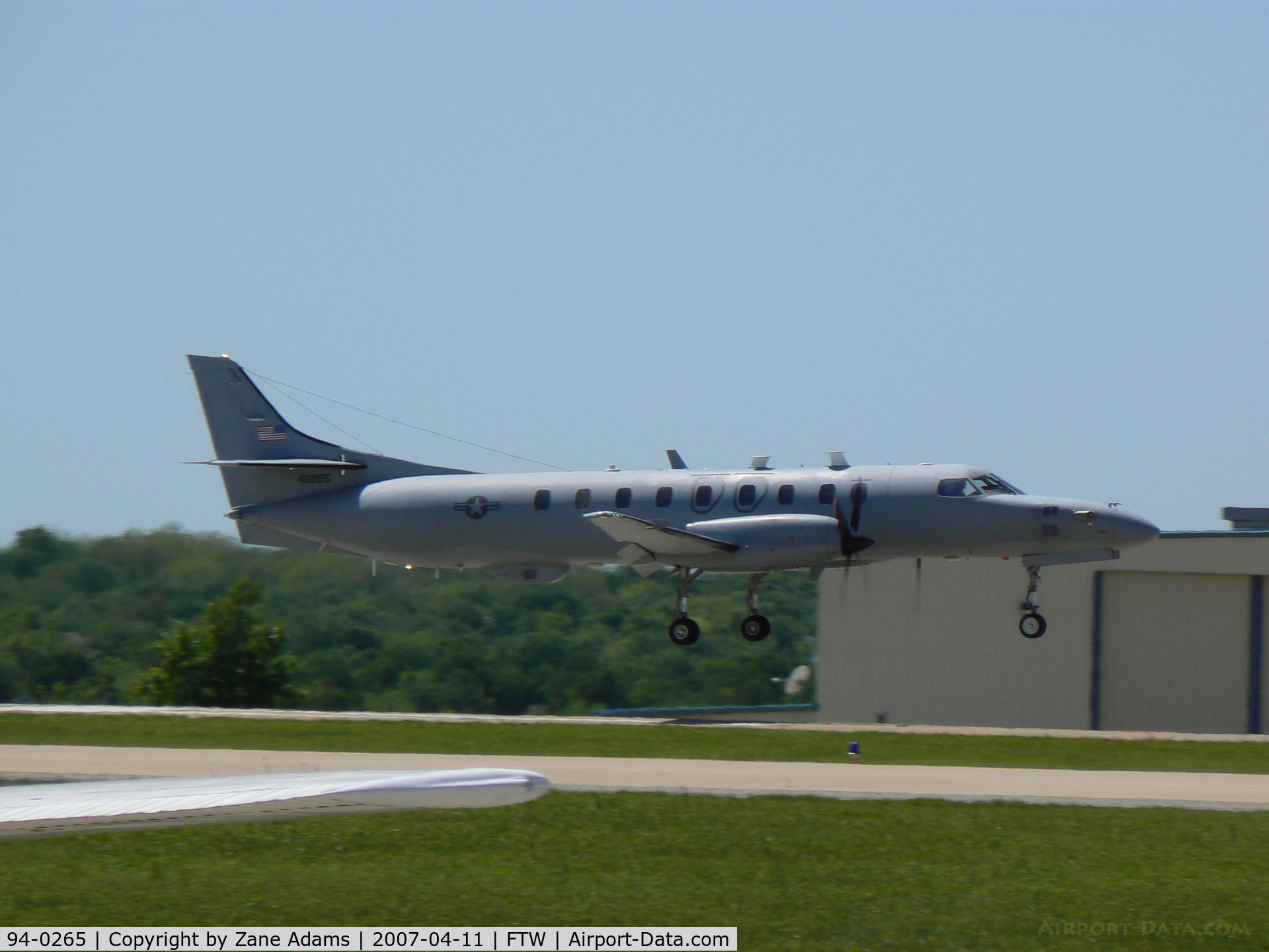 94-0265, 1994 Fairchild RC-26B Condor C/N DC-863B, Landing at Meacham Field (ATK on field)