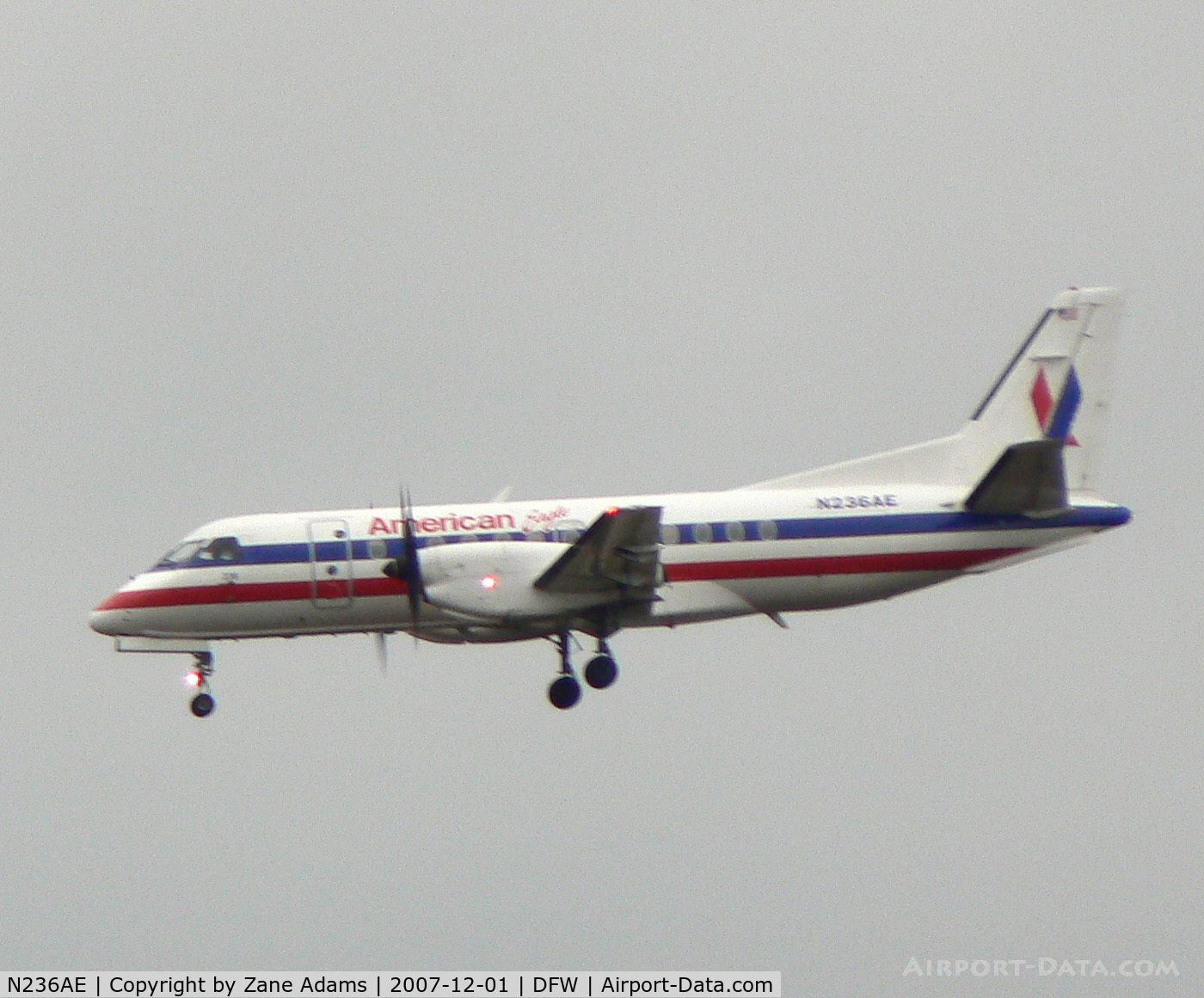 N236AE, 1991 Saab 340B C/N 340B-236, Rainy day at DFW - Landing 18R