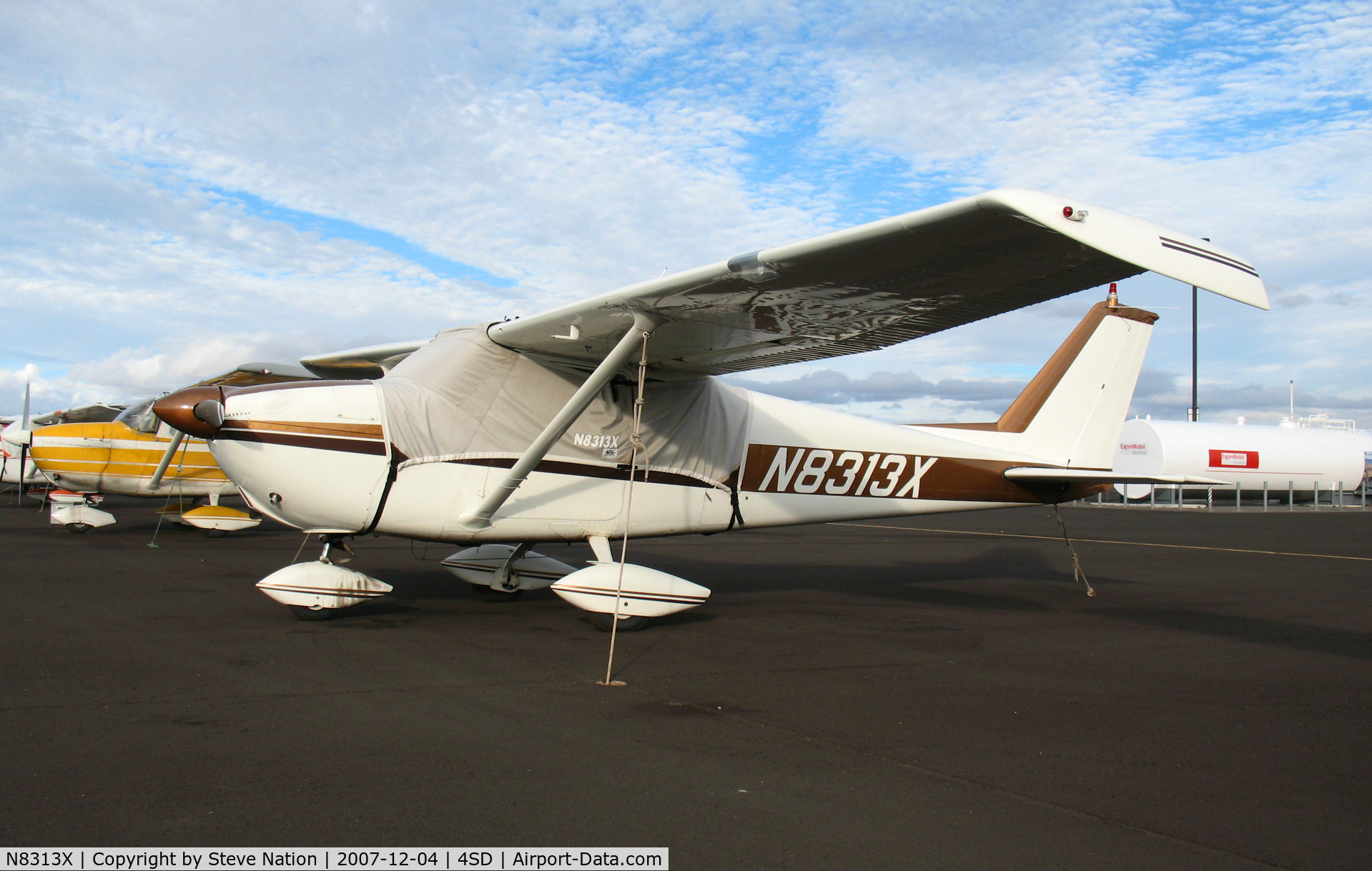 N8313X, 1961 Cessna 172C C/N 17248813, 1961 Cessna 172C with cover @ Reno-Stead