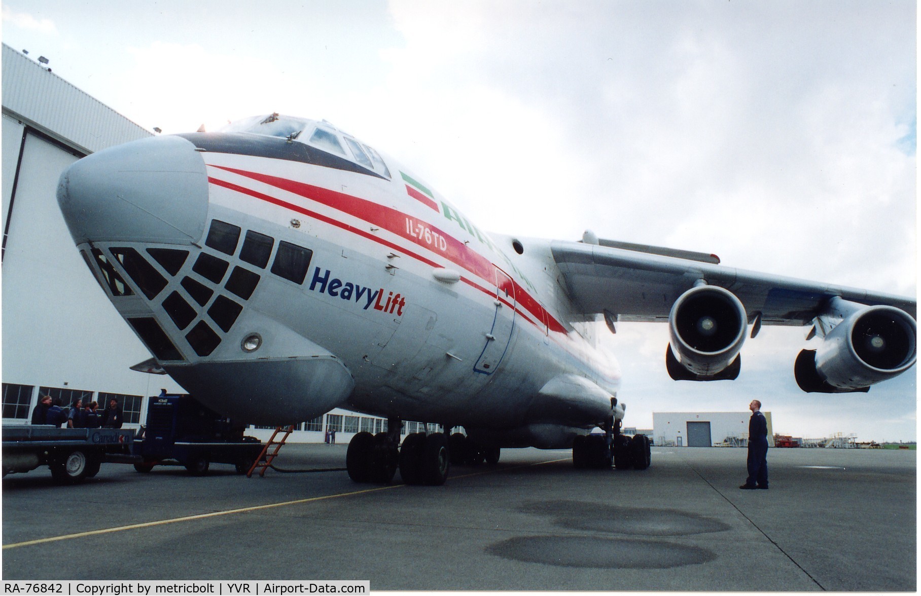 RA-76842, 1994 Ilyushin Il-76TD C/N 1033418616, 24mm lens on 35mm camera exaggerates size of airplane.Mar.2000