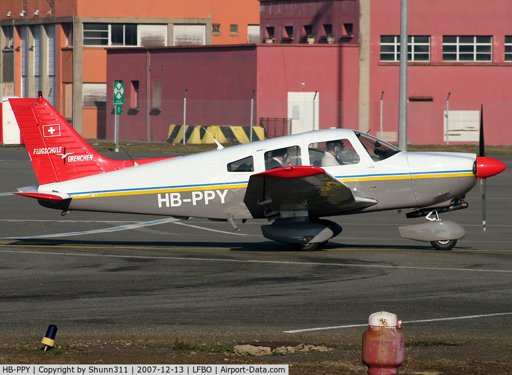HB-PPY, 1993 Piper PA-28-181 Archer II C/N 2890194, Arriving from a light flight and parked at the general aviation apron