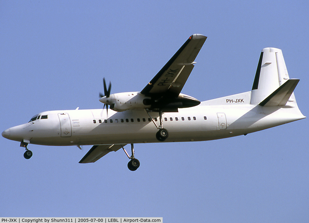 PH-JXK, 1991 Fokker 50 C/N 20233, Landing rwy 25R with additional 'operated by Denim Air' titles near door