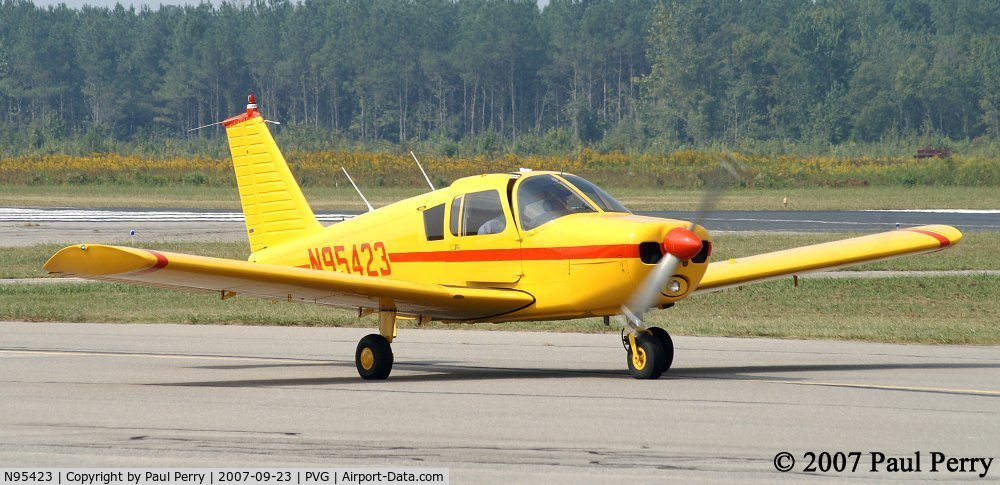 N95423, 1969 Piper PA-28-140 C/N 28-25941, A vibrantly colored tenant here