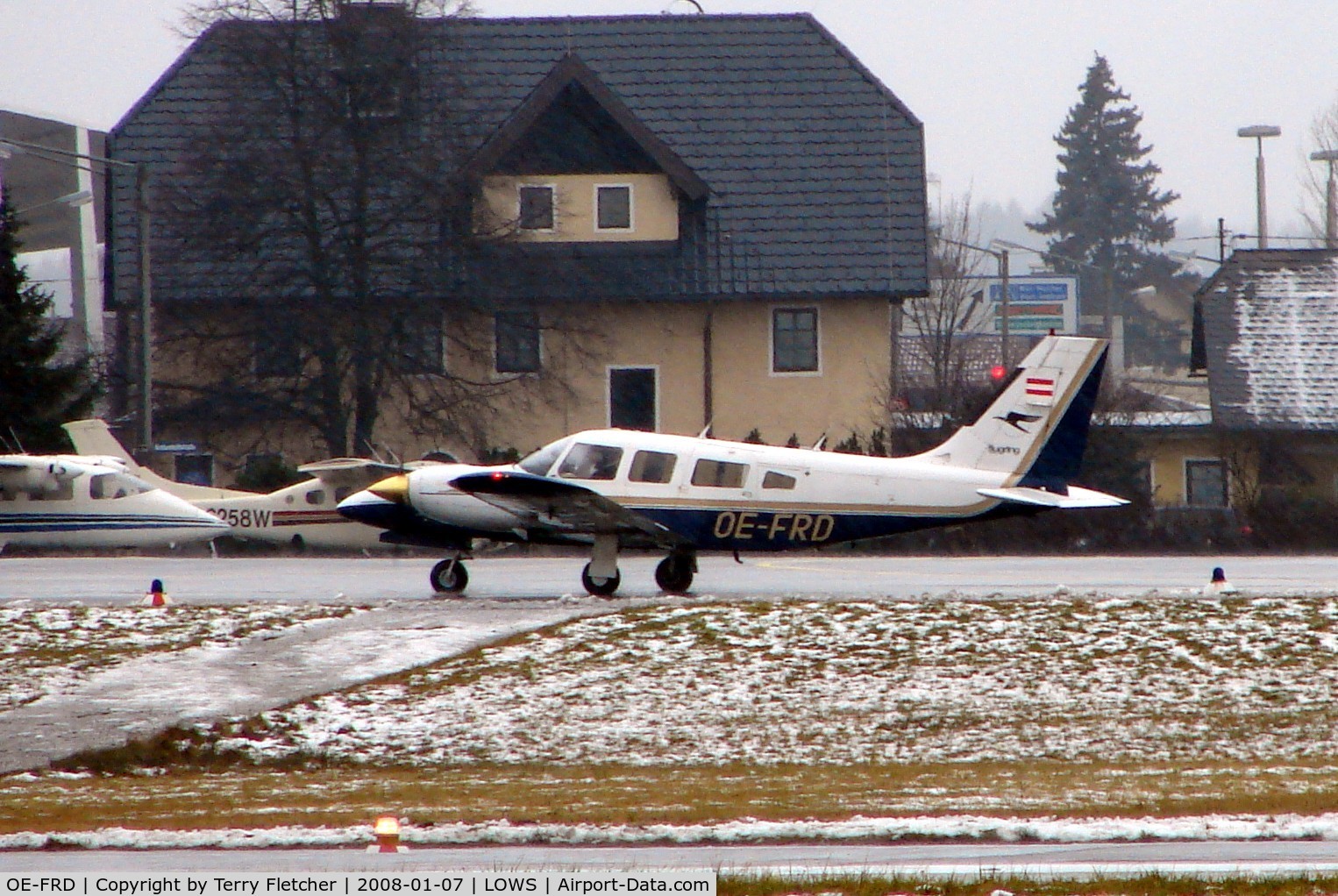 OE-FRD, Piper PA-34-220T C/N 34-8133069, Pa-34-220T taxies past the visitors on the GA ramp at Salzburg