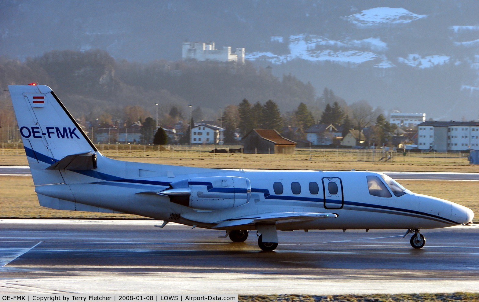 OE-FMK, 1980 Cessna 501 Citation I/SP C/N 501-0144, Cessna 501 taxies out against the backdrop of the ancient Salzburg Fortress