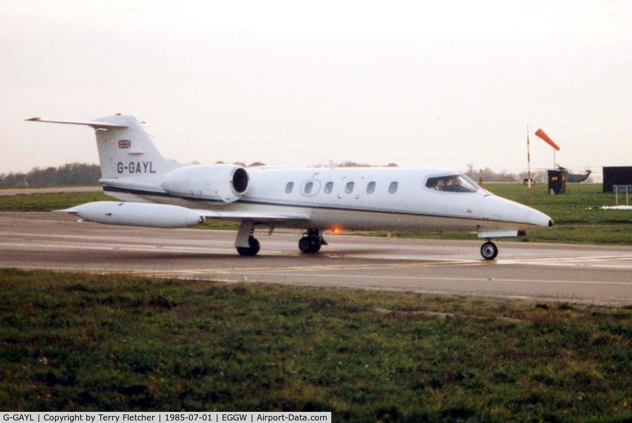 G-GAYL, 1981 Learjet 35A C/N 35A-429, Learjet 35A taxies in at Luton in 1985 - now registered as A6-RJH