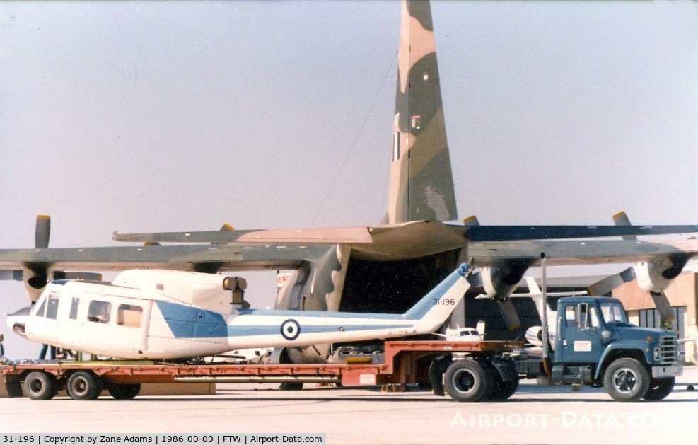 31-196, Bell 212 C/N 30863, Greek Bell 212 / UH-1 being loaded on to a Greek C-130H at Meacham Field