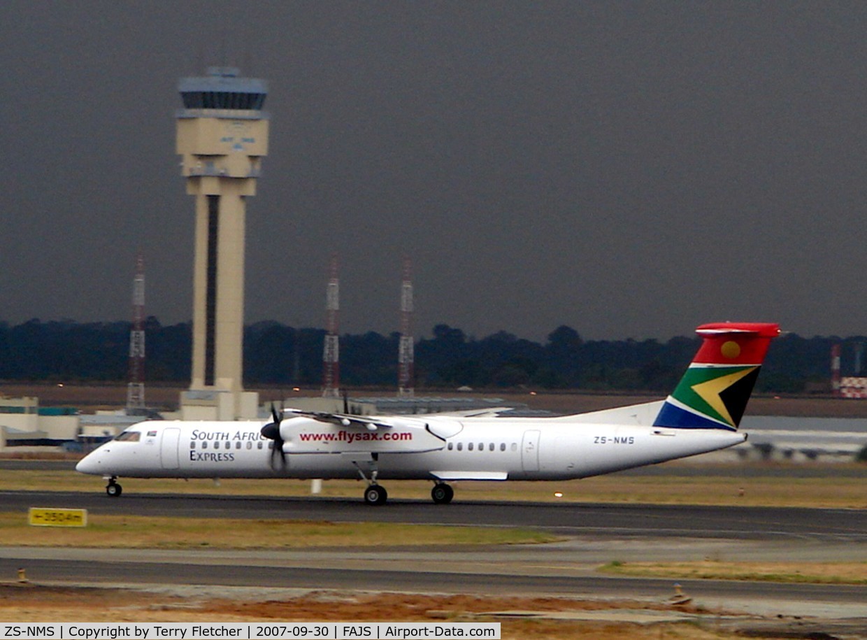 ZS-NMS, 2006 De Havilland Canada DHC-8-402Q Dash 8 C/N 4127, South African Airways Dash 8 lands at Johannesburg against the backdrop of threatening skies
