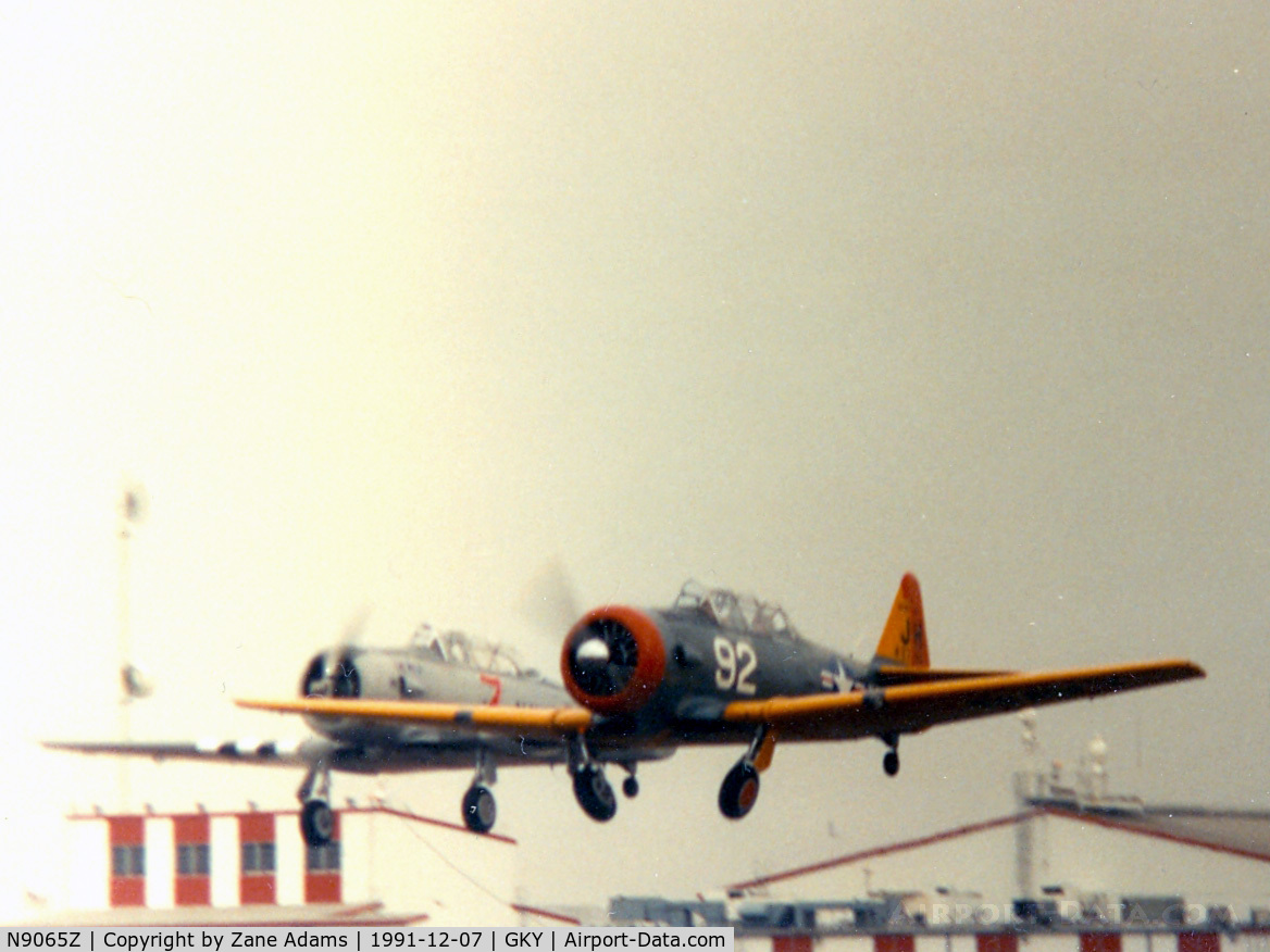 N9065Z, 1959 North American SNJ-5C Texan C/N 88-15836, Departing Arlington (along with N97AW) for 50th Anniversary Pearl Harbor Day Flyover 1991