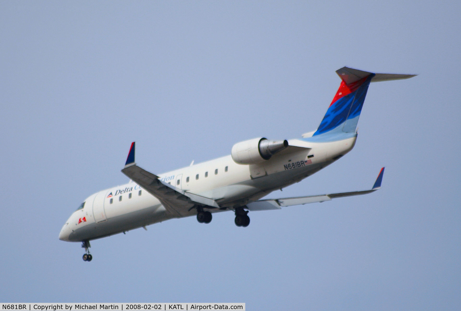 N681BR, 2002 Bombardier CRJ-200ER (CL-600-2B19) C/N 7680, Over the numbers of 26R