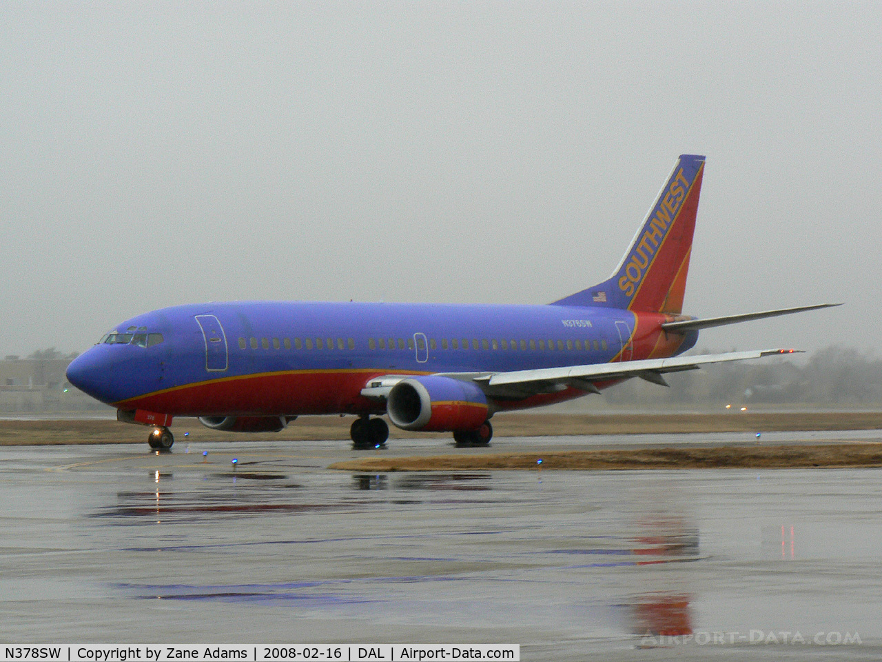 N378SW, 1994 Boeing 737-3H4 C/N 26585, Southwest Airlines - In the rain at Love Field, Dallas, TX