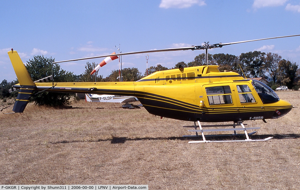 F-GKGR, Agusta AB-206B JetRanger II C/N 8294, Parked in this small grass airfield...