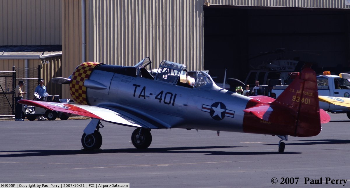 N4995P, 1951 North American T-6G Texan C/N 168-525, Awaiting her part in the morning sun