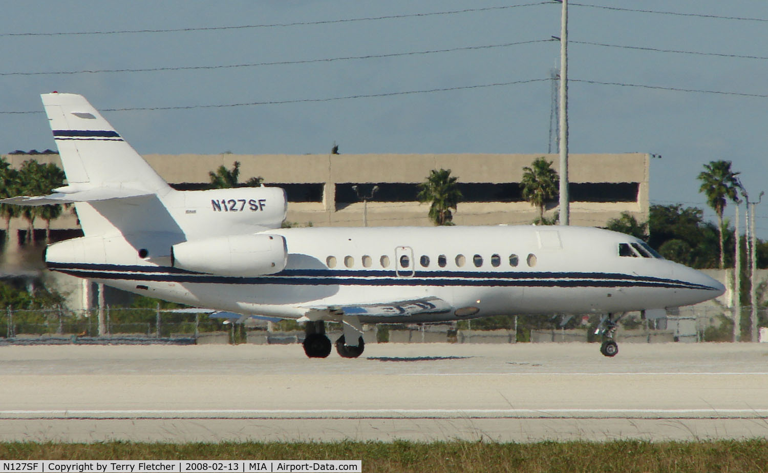 N127SF, 1997 Dassault Falcon 900EX C/N 013, Falcon 900EX about to depart Miami in the mid-afternoon heat