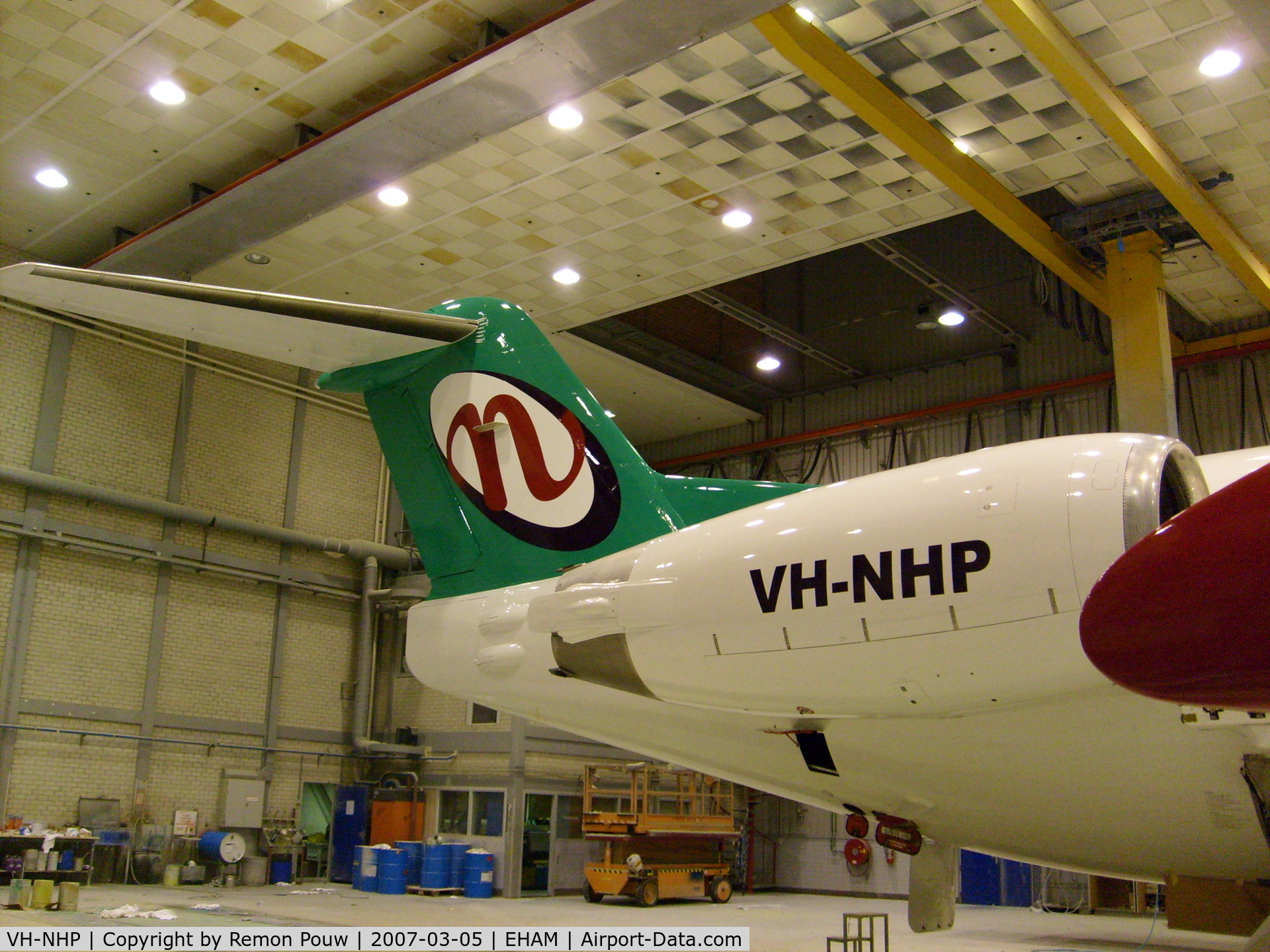 VH-NHP, 1992 Fokker 100 (F-28-0100) C/N 11399, First jet powered aircraft for Network Aviation. Seen here inside the QAPS painting hangar at Schiphol, approx. 8 hours before it rolled out. (Ex Air Berlin D-AGPS)