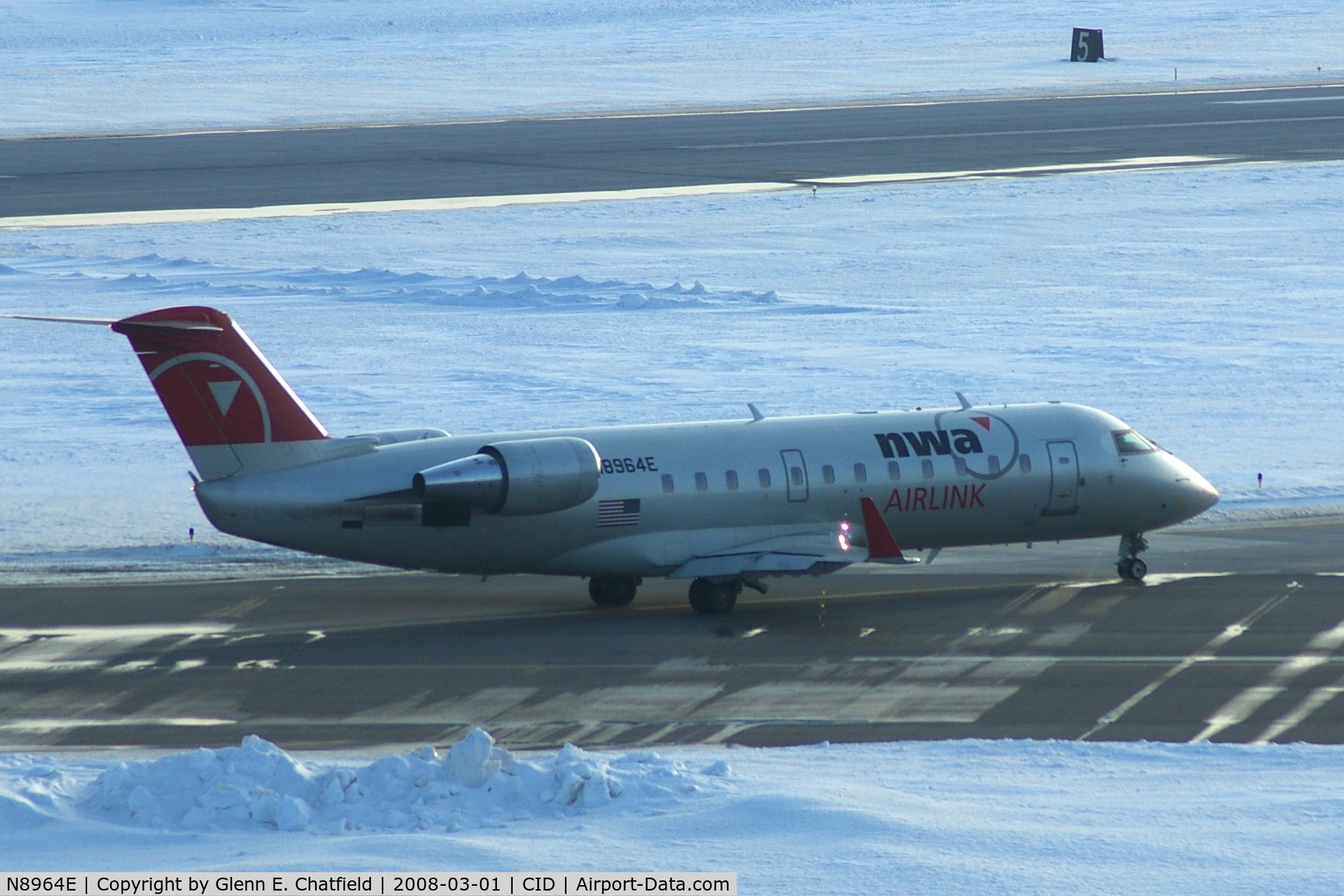 N8964E, 2004 Bombardier CRJ-200 (CL-600-2B19) C/N 7964, Taxiing to Runway 9 for departure