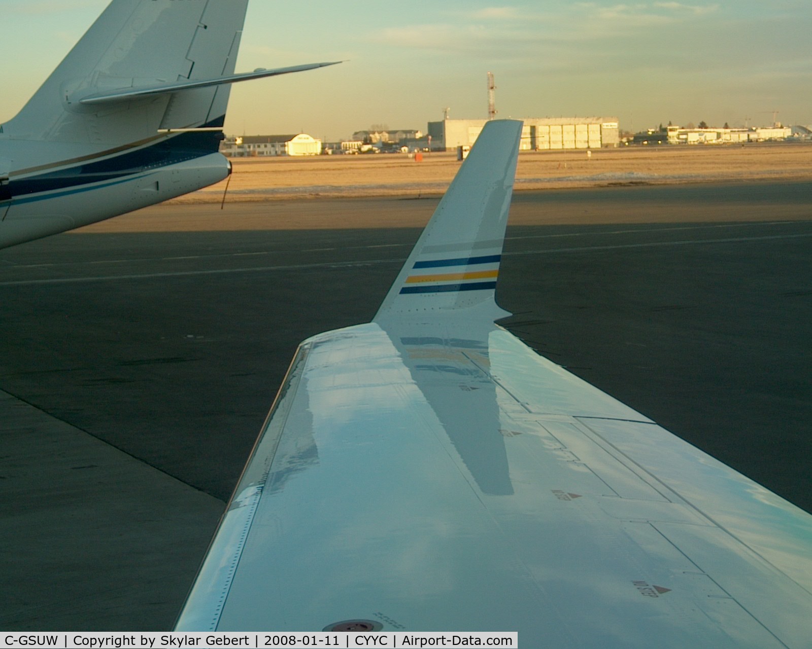 C-GSUW, 2005 Canadair CRJ-200LR (CL-600-2B19) C/N 8047, looking out at the rightside wing