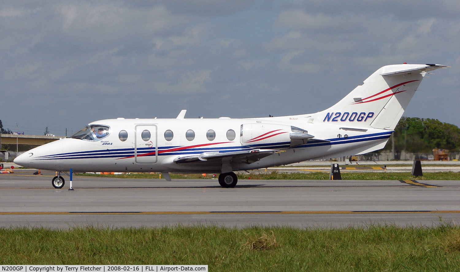 N200GP, 1997 Raytheon Aircraft Company 400A C/N RK-172, Colourful Beechjet 400 about to depart FLL