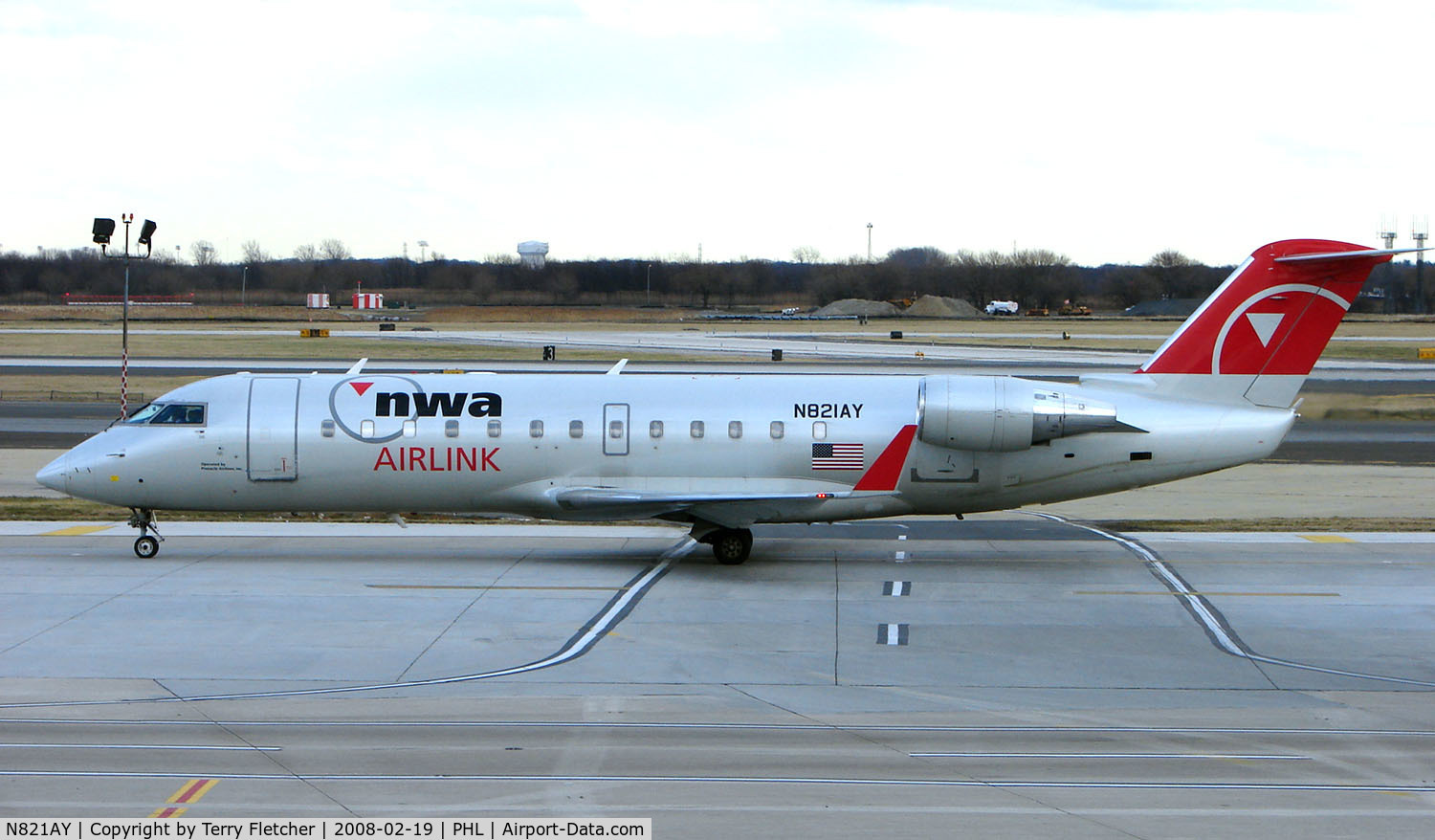 N821AY, 2005 Bombardier CRJ-200LR (CL-600-2B19) C/N 8021, Northwest CRJ arrives at Philadelphia