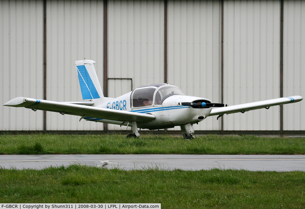 F-GBCR, Socata MS-880B Rallye Club C/N 3037, Parked in the grass in front of the maintenance hangar