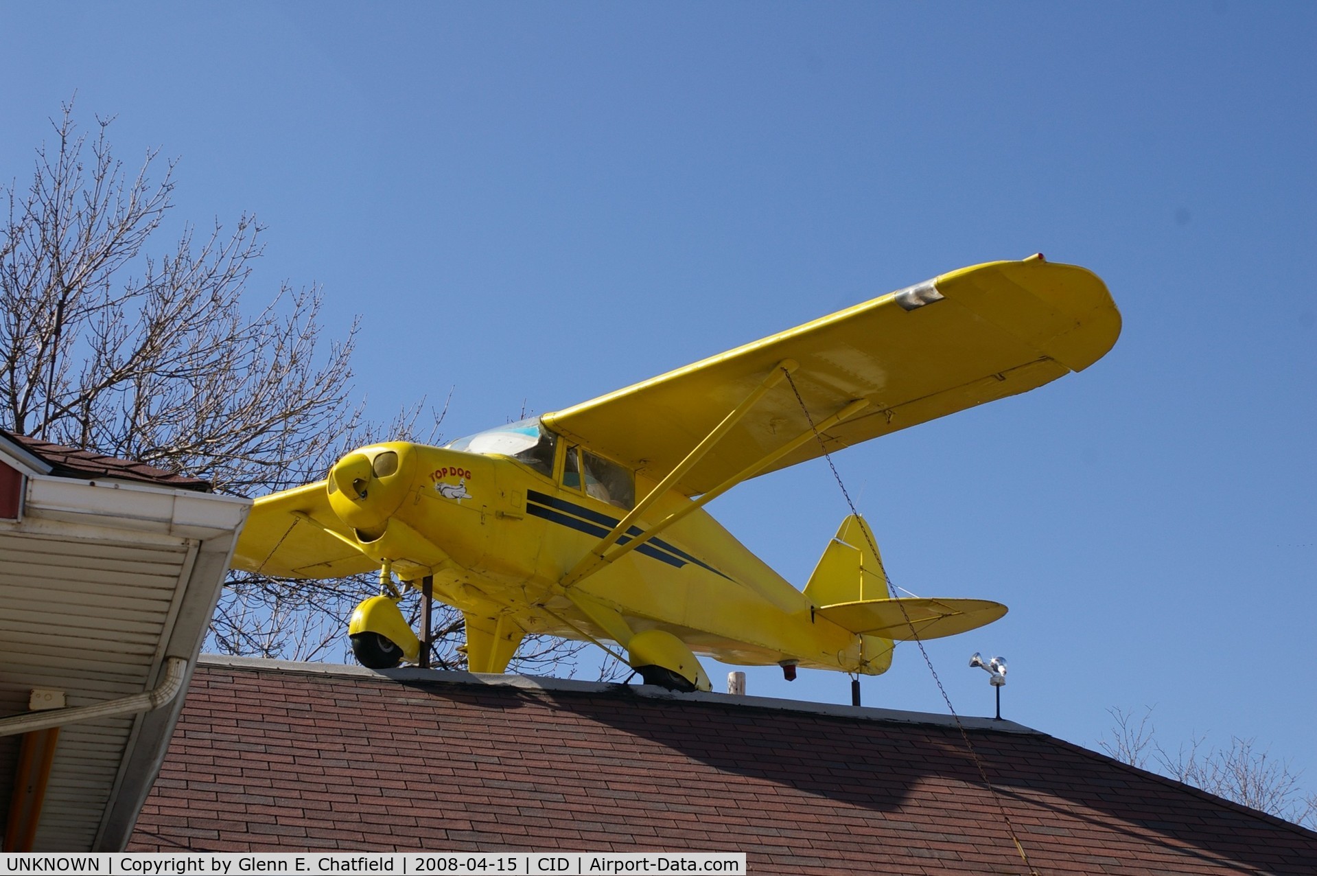 UNKNOWN, , Piper Colt on top of the Flying Weenie, downtown Cedar Rapids, IA.  Even the tables have sectional charts.  Lots of airplane stuff inside