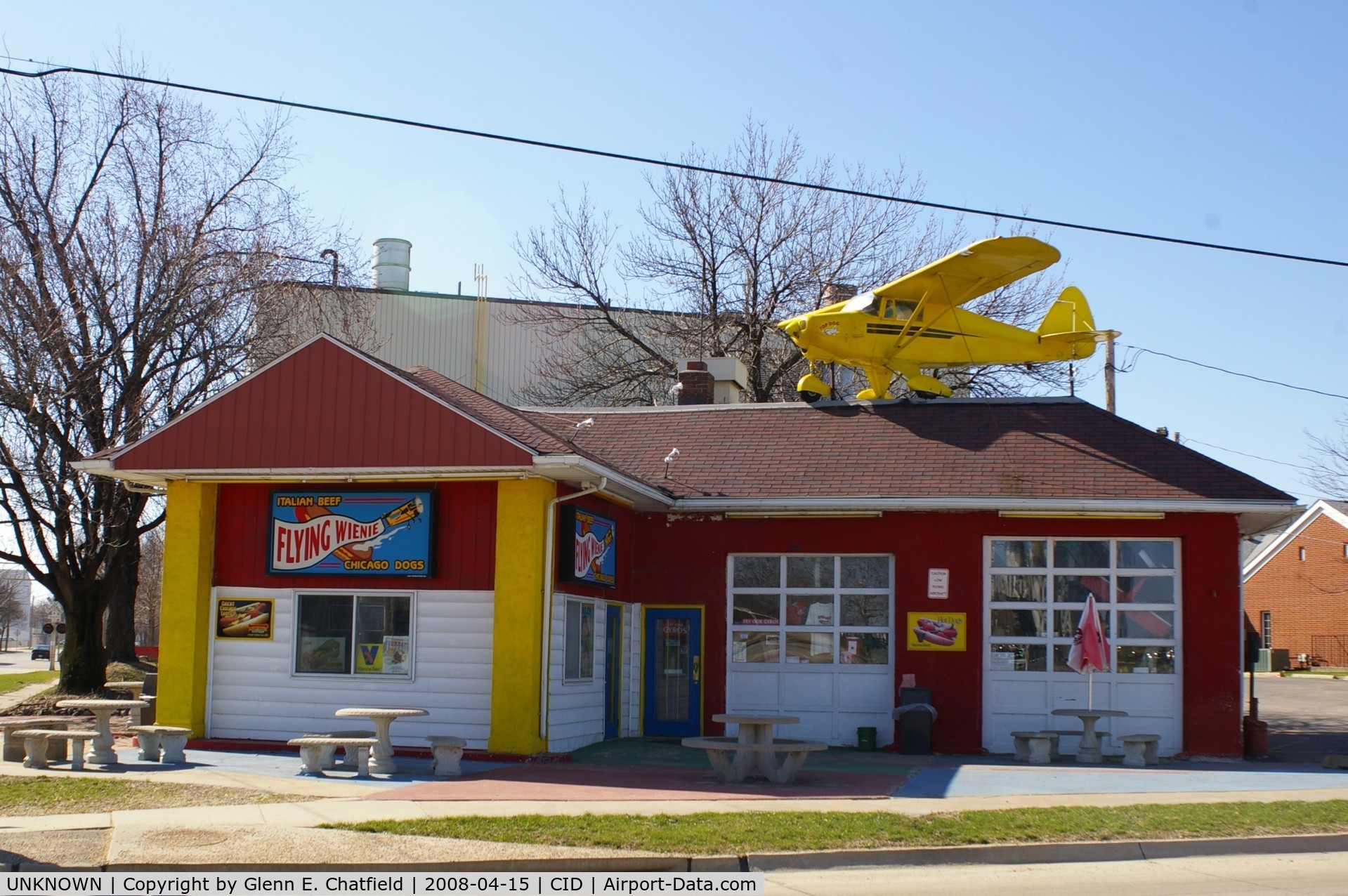 UNKNOWN, , Piper Colt on top of the Flying Weenie, downtown Cedar Rapids, IA.  Even the tables have sectional charts.  Lots of airplane stuff inside