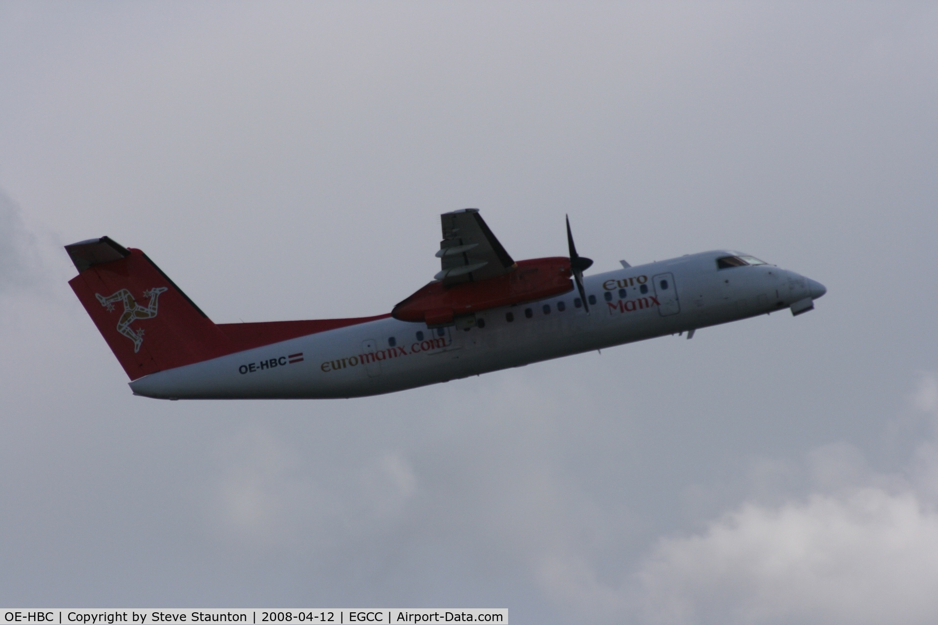 OE-HBC, 1999 De Havilland Canada DHC-8-311 Dash 8 C/N 533, Taken at Manchester Airport on a typical showery April day