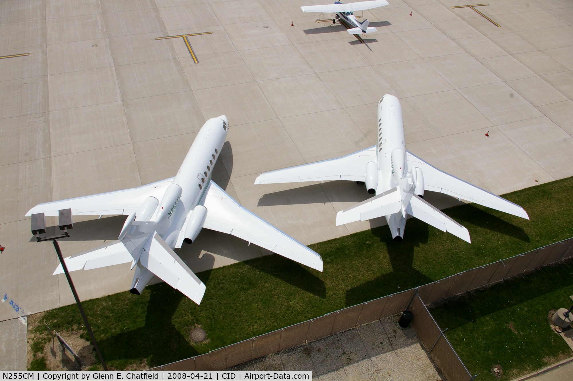 N255CM, 1996 Dassault Falcon 50 C/N 255, Below the control tower.  Plane on the right is N344CM.