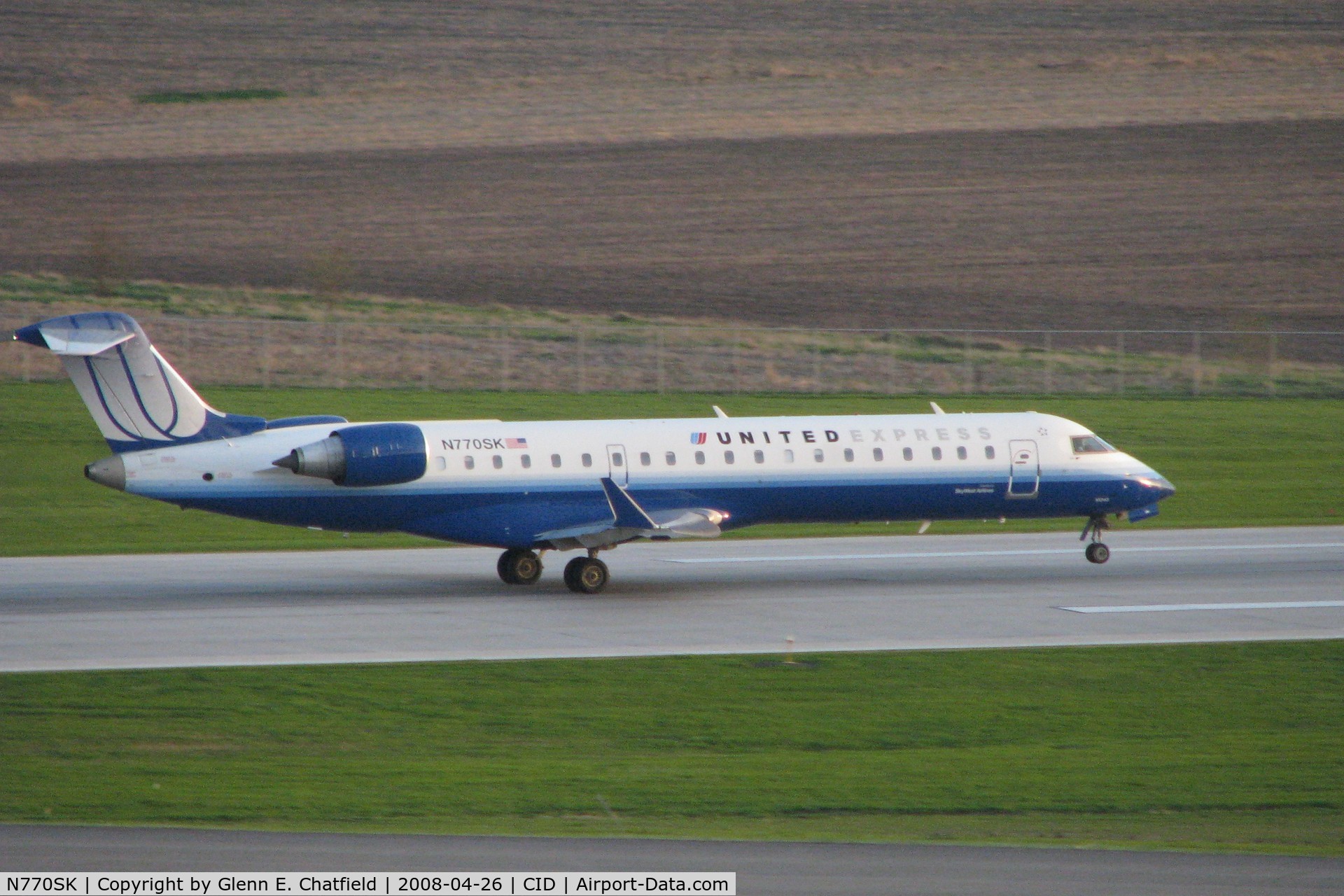 N770SK, 2006 Canadair CL-600-2C10 Regional Jet CRJ-700 C/N 10243, Departing Runway 27, late evening