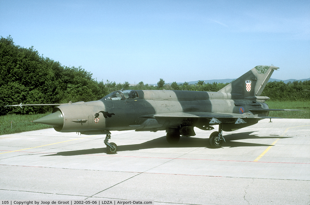 105, Mikoyan-Gurevich MiG-21bis C/N Not found 105, Not often seen: the Croatian MiG-21. The serial number is hand written in the main wheel bay.