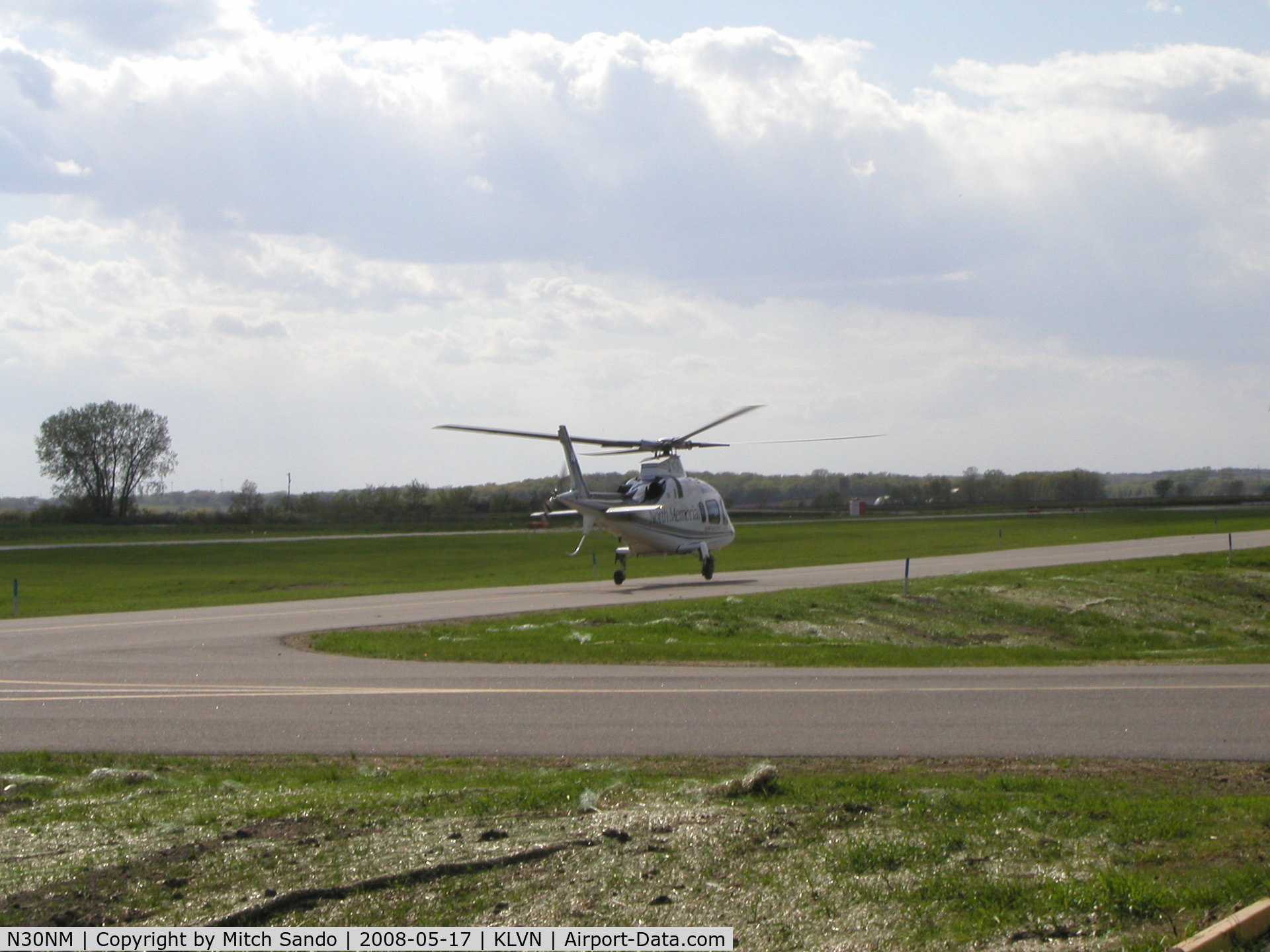 N30NM, Agusta A-109E Power C/N 11065, Departing the parallel taxiway to Runway 30 VFR to Brainerd, MN (BRD).