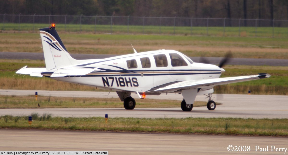 N718HS, 2002 Raytheon Aircraft Company A36 Bonanza C/N E-3462, Making her way onto the taxiway
