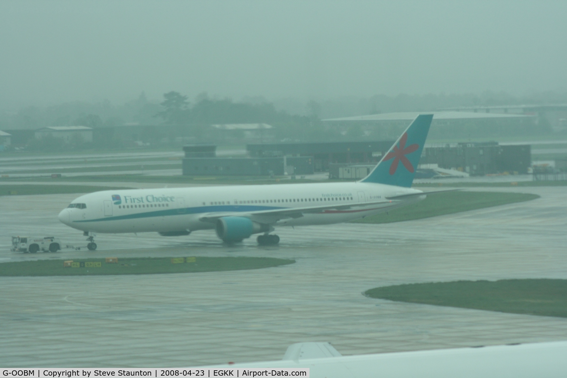 G-OOBM, 1995 Boeing 767-324 C/N 27568, Taken on a gloomy wet morning at Gatwick Airport