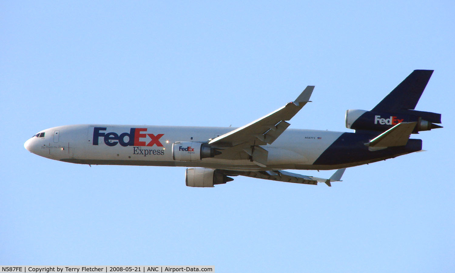 N587FE, 1992 McDonnell Douglas MD-11F C/N 48489, FedEX MD11 climbs out of Anchorage